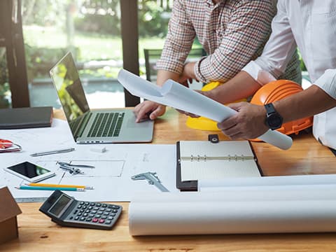 people working with blueprints
